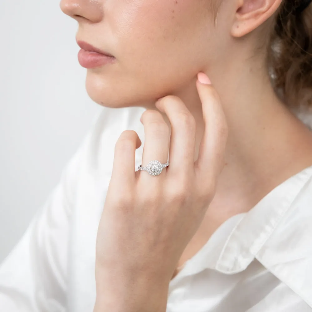 14ct White Gold 1 Carat Brilliant Cut Diamond Solitaire Ring with Double Diamond Halo and Diamond Split Shank Shiels