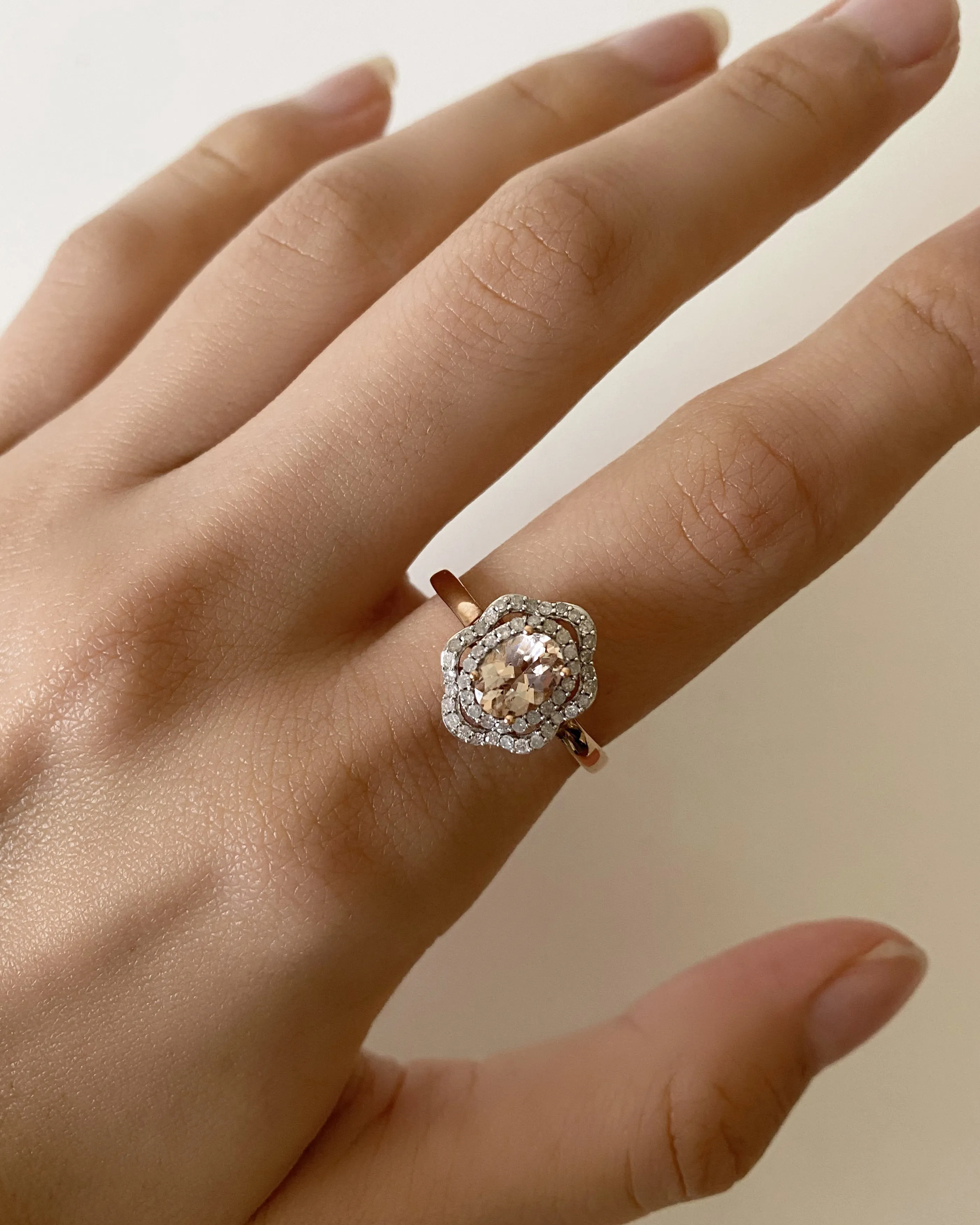 9ct Rose Gold Morganite 7x5mm 0.65 Carats and Diamonds 0.25 Carats Floral Halo Ring Shiels