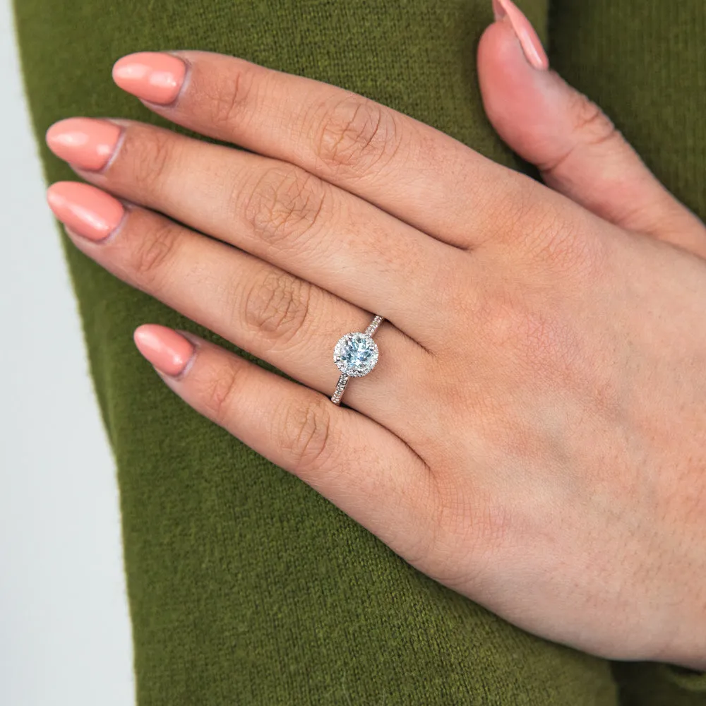 9ct White Gold 0.75ct Aquamarine and 1/10 Carat Diamond Halo Ring Shiels