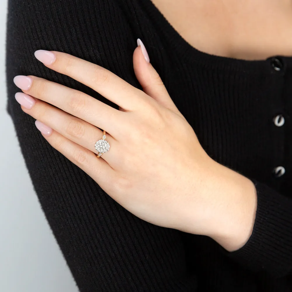 Luminesce Lab Grown Oval Ring with 28 Diamonds Set in 9 Carat Yellow Gold Shiels
