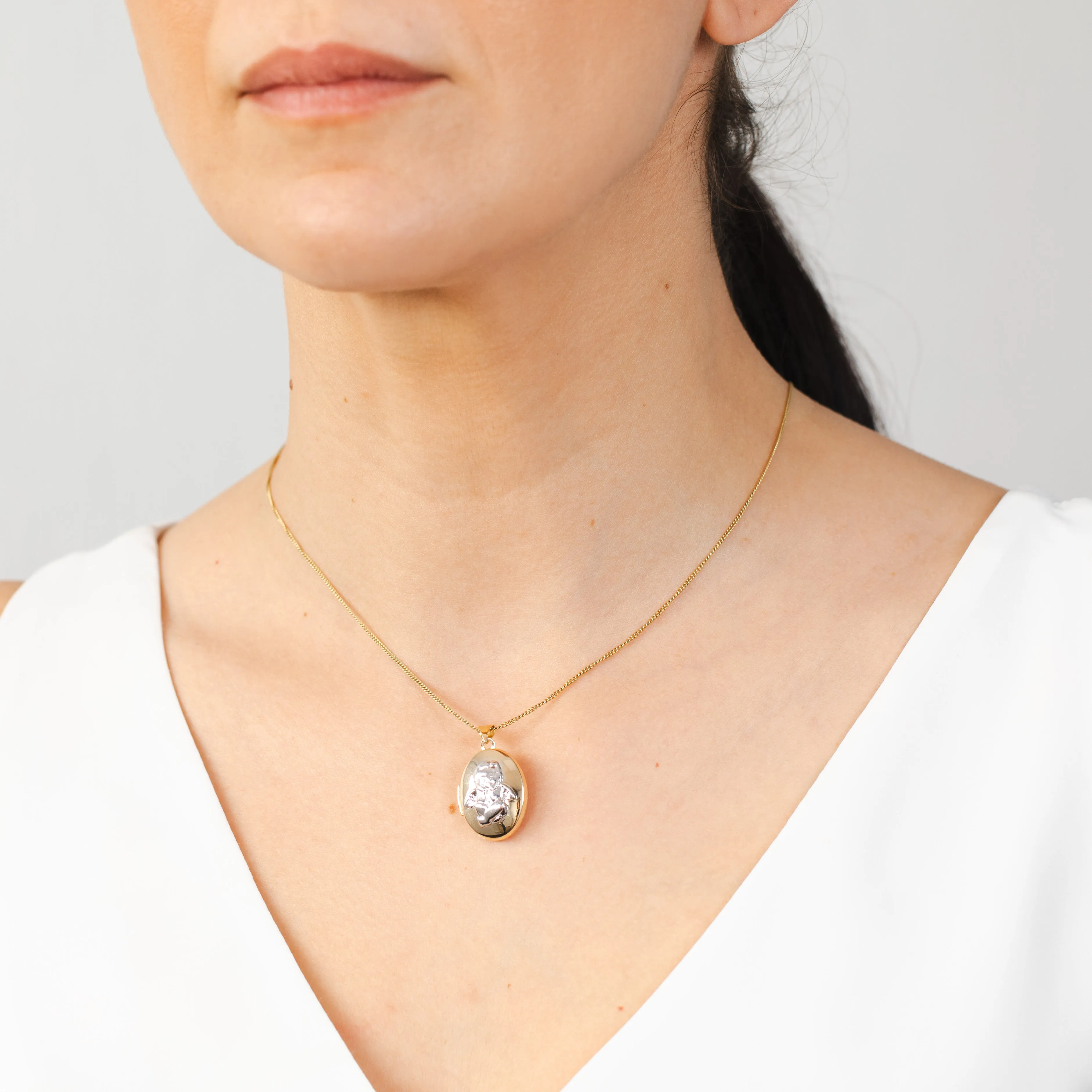 Sterling Silver Gold Plated Locket With Silver Angel Pendant Shiels