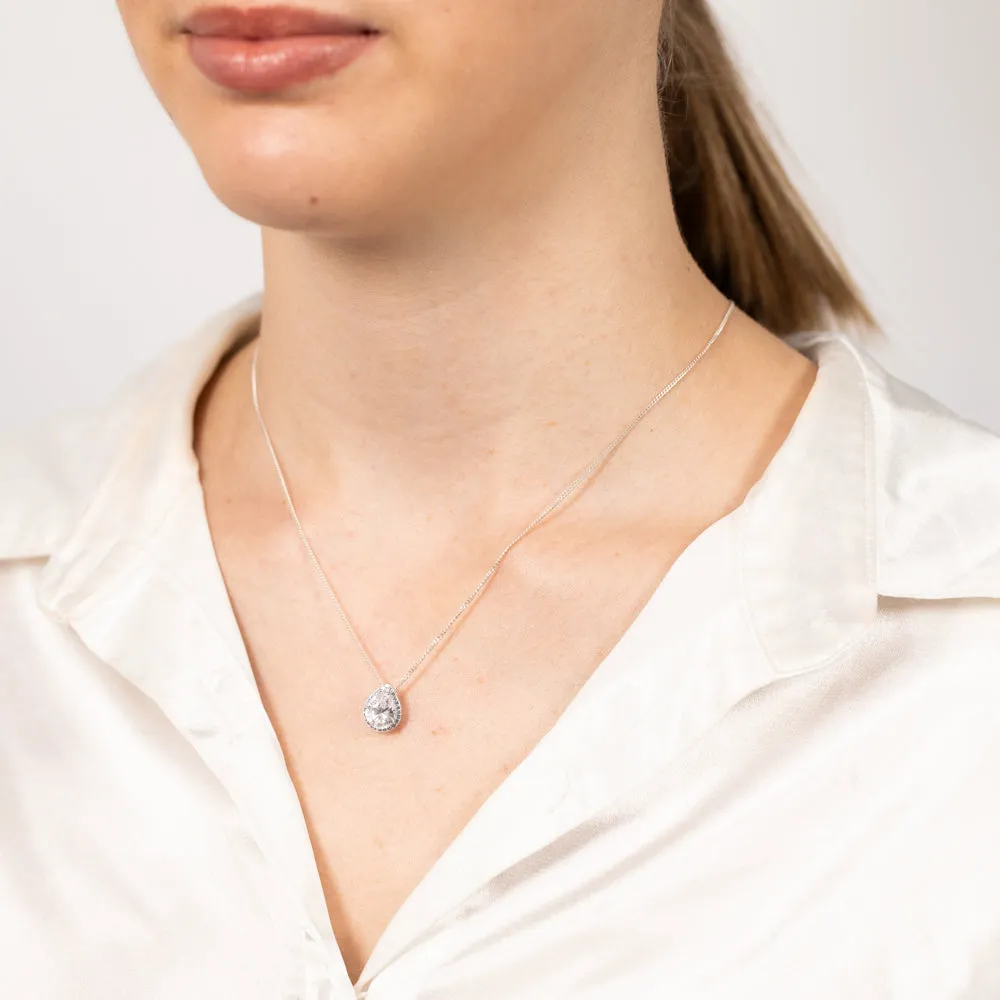 Sterling Silver Rhodium Plated Pear Shaped Light Blue And White Zirconia Pendant Shiels